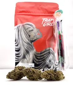 (each) *Deal! $99 1 oz. Purple Biscotti (35.66%/Hybrid) - Trap Girl + Writing Pen